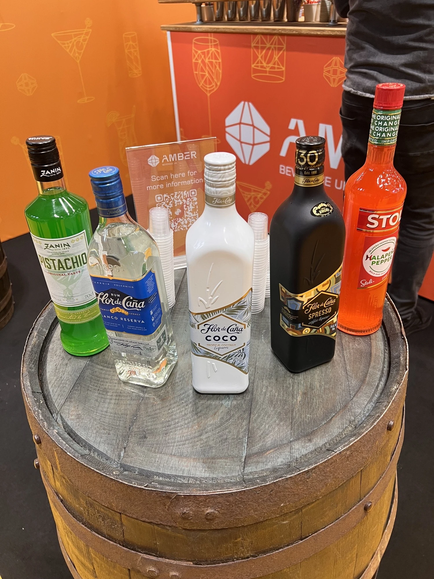 Product display on a barrel within the stand.